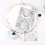 Maffily 50pcs Laser Cut Wedding Invitation Pockets 5×7 ” Dusty Blue Wedding Invitations Kit With Envelopes Blank Inner Sheet and Ribbon for Wedding Bridal Shower Quinceanera Engagement Party Invite